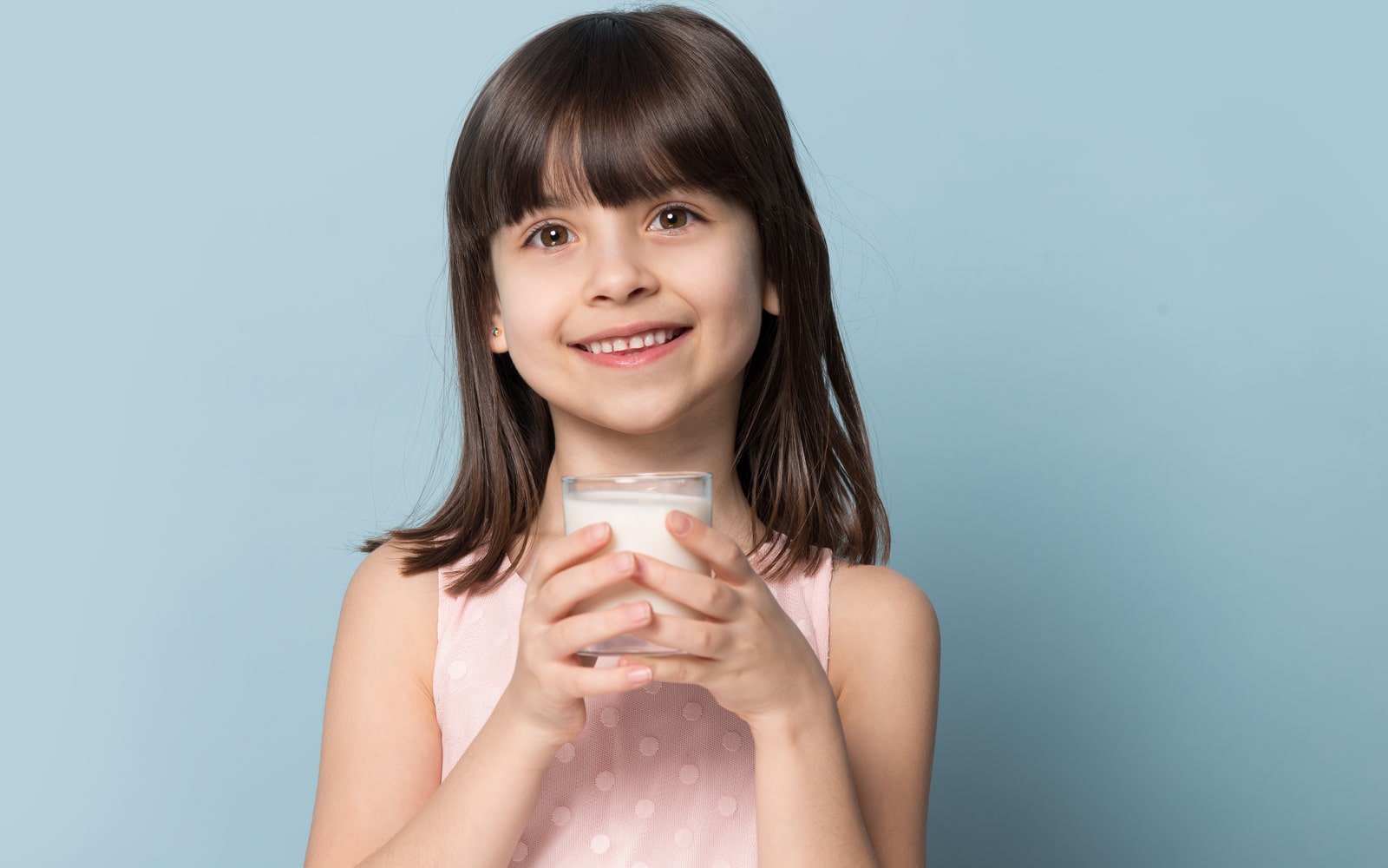 Child Drinking Milk Smiling